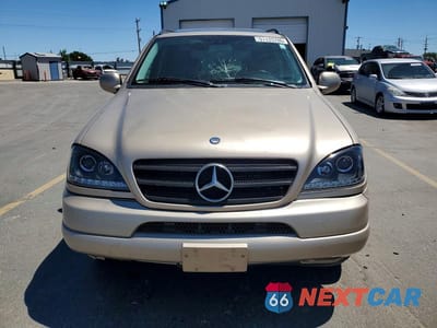 Piąte zdjęcie samochodu w środku: 2001 MERCEDES-BENZ ML 320 VIN:4JGAB54E61A277132 - miniatura