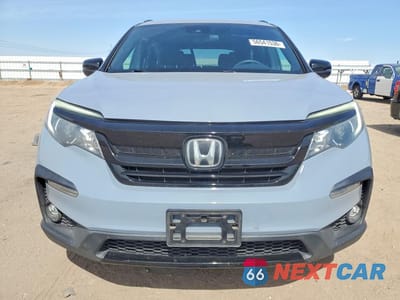 Piąte zdjęcie samochodu w środku: 2022 HONDA PILOT SPORT VIN:5FNYF6H31NB041507 - miniatura