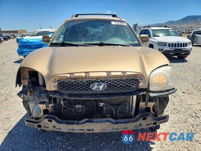 Piąte zdjęcie samochodu w środku: 2004 HYUNDAI SANTA FE GLS VIN:KM8SC73DX4U728314 - miniatura