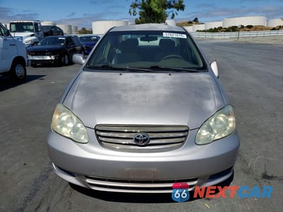Piąte zdjęcie samochodu w środku: 2003 TOYOTA COROLLA LE VIN:1NXBR32E33Z109103 - miniatura