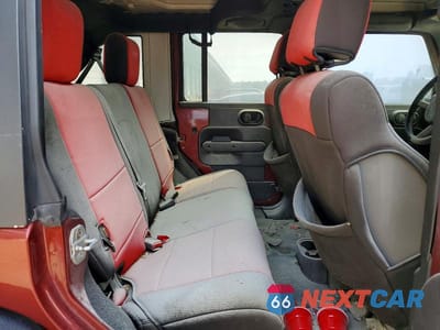 Zdjęcie 11 z 13 samochodu: 2008 JEEP WRANGLER UNLIMITED SAHARA VIN:1J4GA59138L644603 - miniatura