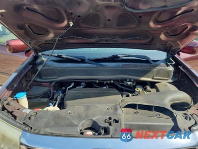 Zdjęcie 12 z 13 samochodu: 2012 HONDA PILOT EXL VIN:5FNYF4H5XCB027530 - miniatura