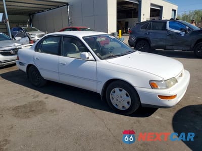 Czwarte zdjęcie samochodu z boku: 1997 TOYOTA COROLLA DX VIN:1NXBB02E9VZ515263 - miniatura