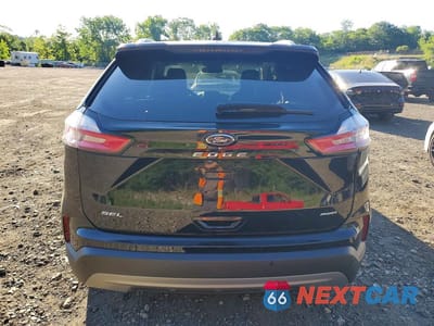 Zdjęcie 6 z 13 samochodu: 2021 FORD EDGE SEL VIN:2FMPK4J98MBA11048 - miniatura