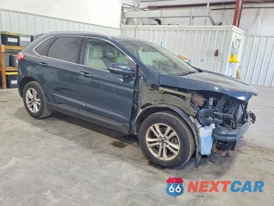 Czwarte zdjęcie samochodu z boku: 2019 FORD EDGE SEL VIN:2FMPK4J90KBB13800 - miniatura