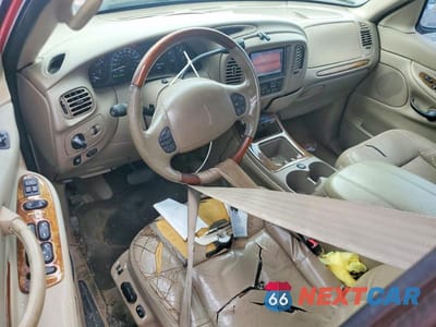 Zdjęcie 8 z 12 samochodu: 2001 LINCOLN NAVIGATOR VIN:5LMEU27R81LJ28117 - miniatura