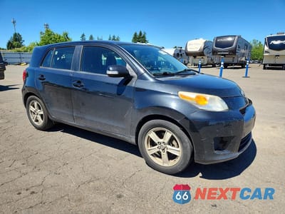 Czwarte zdjęcie samochodu z boku: 2011 SCION XD BASE VIN:JTKKU4B4XB1012991 - miniatura
