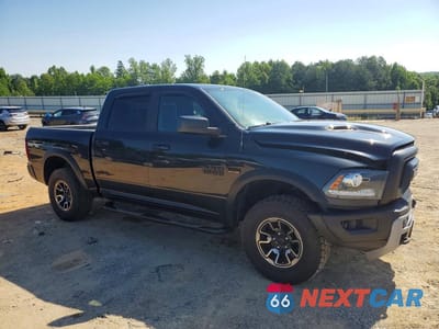 Czwarte zdjęcie samochodu z boku: 2017 RAM 1500 REBEL VIN:1C6RR7YT4HS688970 - miniatura