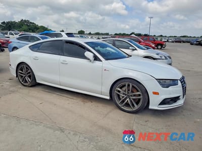 Czwarte zdjęcie samochodu z boku: 2016 AUDI A7 PRESTIGE VIN:WAU2GAFC0GN167500 - miniatura
