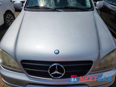 Zdjęcie 11 z 12 samochodu: 2001 MERCEDES-BENZ ML 430 VIN:4JGAB72E21A280348 - miniatura