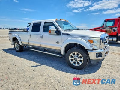 Czwarte zdjęcie samochodu z boku: 2011 FORD F350 SUPER DUTY VIN:1FT8W3BT3BEC16117 - miniatura