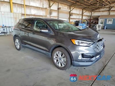 Czwarte zdjęcie samochodu z boku: 2019 FORD EDGE TITANIUM VIN:2FMPK4K90KBC02023 - miniatura
