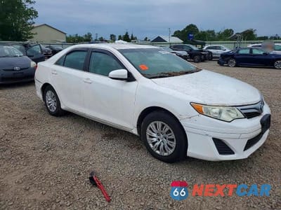 Czwarte zdjęcie samochodu z boku: 2014 TOYOTA CAMRY HYBRID LE VIN:4T1BD1FK5EU111408 - miniatura