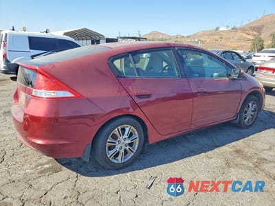 Trzecie zdjęcie samochodu z tyłu: 2010 HONDA INSIGHT EX VIN:JHMZE2H74AS034601 - miniatura