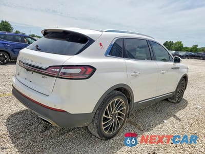Trzecie zdjęcie samochodu z tyłu: 2019 LINCOLN NAUTILUS RESERVE VIN:2LMPJ6L92KBL23430 - miniatura