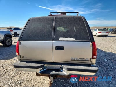 Zdjęcie 6 z 12 samochodu: 1999 CHEVROLET SUBURBAN K1500 VIN:1GNFK16R1XJ559522 - miniatura