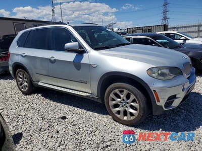 Czwarte zdjęcie samochodu z boku: 2013 BMW X5 XDRIVE35I VIN:5UXZV4C52D0B19408 - miniatura