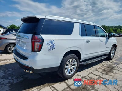 Trzecie zdjęcie samochodu z tyłu: 2023 CHEVROLET SUBURBAN C1500 PREMIER VIN:1GNSCFKDXPR354995 - miniatura