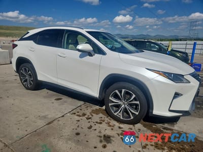 Czwarte zdjęcie samochodu z boku: 2018 LEXUS RX 350 BASE VIN:JTJBZMCAXJ2031978 - miniatura