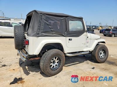 Trzecie zdjęcie samochodu z tyłu: 1997 JEEP WRANGLER / TJ SE VIN:1J4FY29P6VP440618 - miniatura