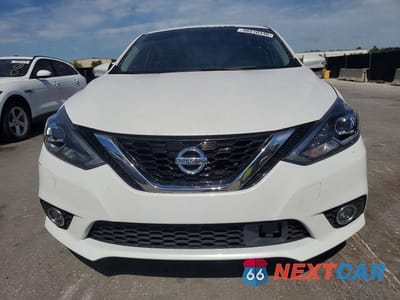 Piąte zdjęcie samochodu w środku: 2018 NISSAN SENTRA SR VIN:3N1AB7AP5JY269995 - miniatura