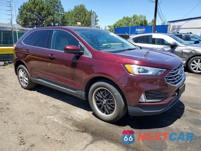 Czwarte zdjęcie samochodu z boku: 2021 FORD EDGE SEL VIN:2FMPK3J91MBA21396 - miniatura