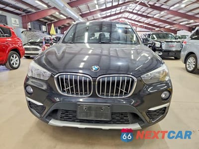 Piąte zdjęcie samochodu w środku: 2018 BMW X1 XDRIVE28I VIN:WBXHT3C36J5K28366 - miniatura