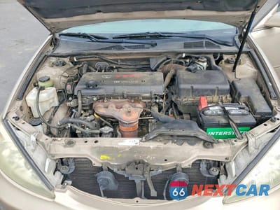 Zdjęcie 11 z 12 samochodu: 2004 TOYOTA CAMRY LE VIN:4T1BE32K64U380773 - miniatura