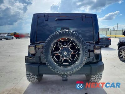 Zdjęcie 6 z 14 samochodu: 2013 JEEP WRANGLER UNLIMITED SAHARA VIN:1C4BJWEG5DL503168 - miniatura