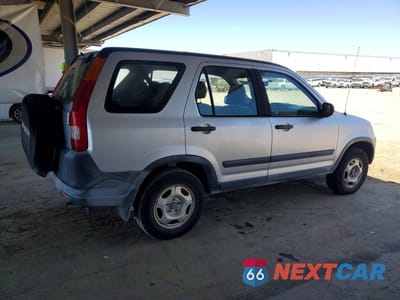 Trzecie zdjęcie samochodu z tyłu: 2002 HONDA CR-V LX VIN:JHLRD68412C016721 - miniatura