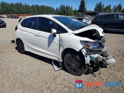 Czwarte zdjęcie samochodu z boku: 2018 HONDA FIT SPORT VIN:3HGGK5H63JM707639 - miniatura