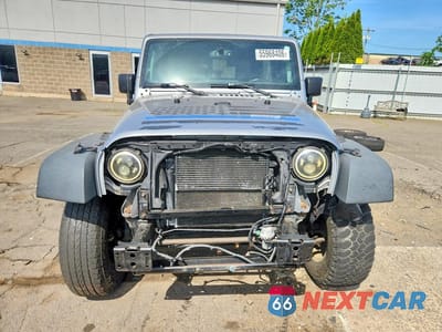 Piąte zdjęcie samochodu w środku: 2016 JEEP WRANGLER UNLIMITED SPORT VIN:1C4BJWDG9GL191510 - miniatura