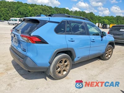 Trzecie zdjęcie samochodu z tyłu: 2023 TOYOTA RAV4 WOODLAND EDITION VIN:2T3UWRFV5PW185904 - miniatura