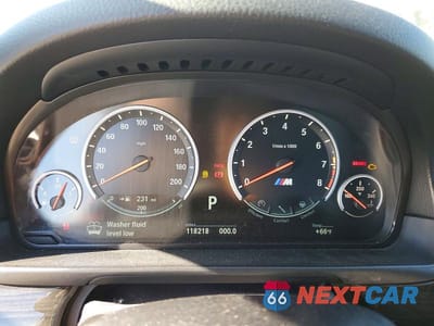 Zdjęcie 9 z 12 samochodu: 2014 BMW M5 VIN:WBSFV9C59ED593292 - miniatura
