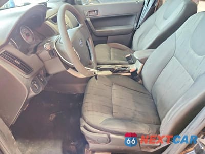 Zdjęcie 7 z 12 samochodu: 2009 FORD FOCUS SE VIN:1FAHP35N39W246805 - miniatura