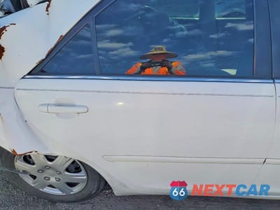 Zdjęcie 10 z 12 samochodu: 2003 TOYOTA CAMRY LE VIN:4T1BE32K23U213454 - miniatura