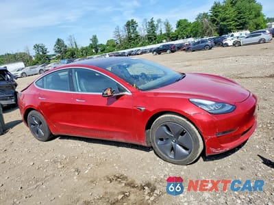 Czwarte zdjęcie samochodu z boku: 2018 TESLA MODEL 3 VIN:5YJ3E1EA8JF004211 - miniatura