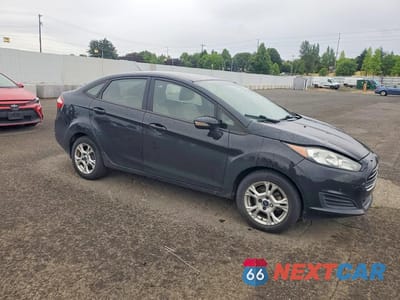 Czwarte zdjęcie samochodu z boku: 2014 FORD FIESTA SE VIN:3FADP4BJ4EM142923 - miniatura