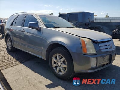 Czwarte zdjęcie samochodu z boku: 2006 CADILLAC SRX VIN:1GYEE637960145575 - miniatura