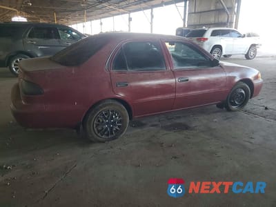 Trzecie zdjęcie samochodu z tyłu: 2001 TOYOTA COROLLA CE VIN:1NXBR12E91Z457859 - miniatura