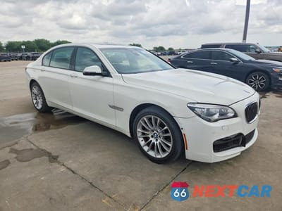 Czwarte zdjęcie samochodu z boku: 2014 BMW 750 LI VIN:WBAYE8C53ED780597 - miniatura