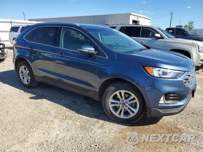 Czwarte zdjęcie samochodu z boku: 2019 FORD EDGE SEL VIN:2FMPK3J94KBC69641 - miniatura