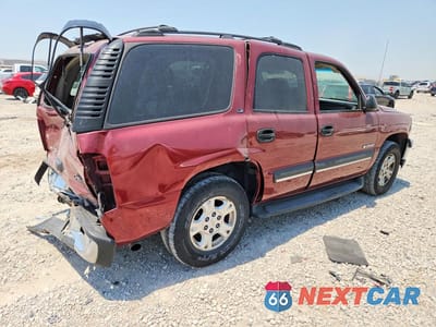 Trzecie zdjęcie samochodu z tyłu: 2002 CHEVROLET TAHOE K1500 VIN:1GNEK13Z52J333525 - miniatura