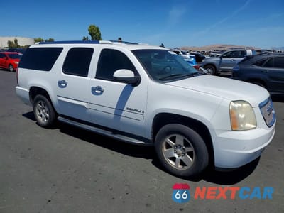 Czwarte zdjęcie samochodu z boku: 2007 GMC YUKON XL DENALI VIN:1GKFK66897J359330 - miniatura