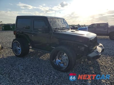 Czwarte zdjęcie samochodu z boku: 2022 JEEP WRANGLER SPORT VIN:1C4GJXAN5NW100100 - miniatura