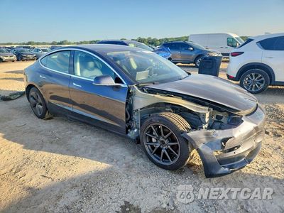 Czwarte zdjęcie samochodu z boku: 2020 TESLA MODEL 3 VIN:5YJ3E1EB2LF741478 - miniatura
