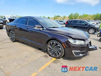 Czwarte zdjęcie samochodu z boku: 2020 LINCOLN MKZ VIN:3LN6L5B92LR622531 - miniatura