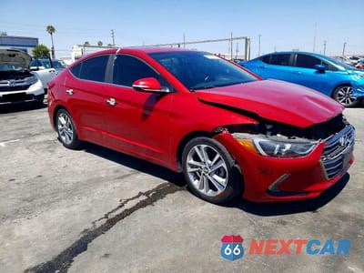 Czwarte zdjęcie samochodu z boku: 2018 HYUNDAI ELANTRA LIMITED VIN:KMHD84LF8JU449014 - miniatura