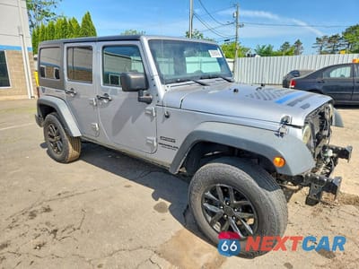Czwarte zdjęcie samochodu z boku: 2016 JEEP WRANGLER UNLIMITED SPORT VIN:1C4BJWDG9GL191510 - miniatura