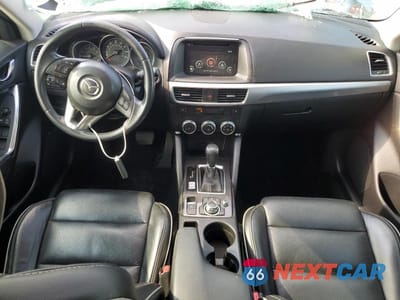 Zdjęcie 6 z 11 samochodu: 2016 MAZDA CX-5 TOURING VIN:JM3KE4CY6G0798153 - miniatura